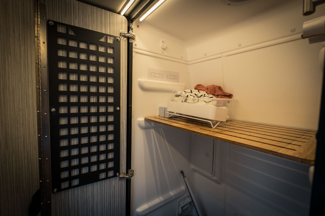 The Original Revel Shower Door MOLLE Panel by FreedomVanGo